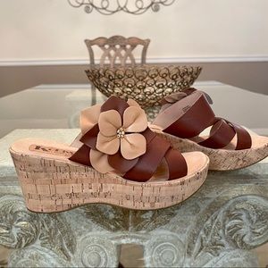 Korks brown leather sandals.